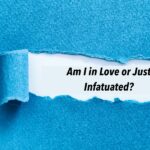 Blue textured paper is torn to reveal the question "Am I in Love or Just Infatuated?" on a white background.