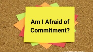A yellow sticky note with the text "Am I Afraid of Commitment?" sits atop a stack of colorful sticky notes on a corkboard background.