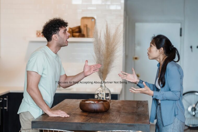 In a kitchen setting, a man and a woman stand facing each other with raised hands, appearing to be in a heated discussion.