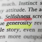 Close-up of a book page with the word "Selfishness" highlighted in red and "generosity" highlighted in yellow.