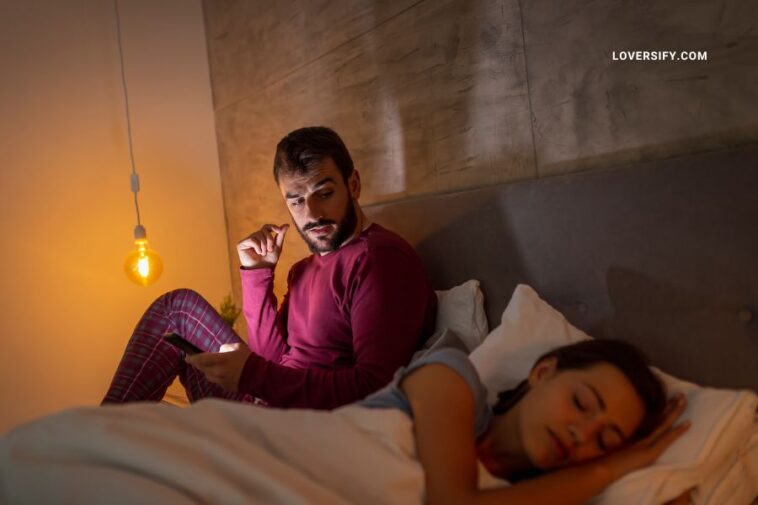 Two people are sleeping in bed at night